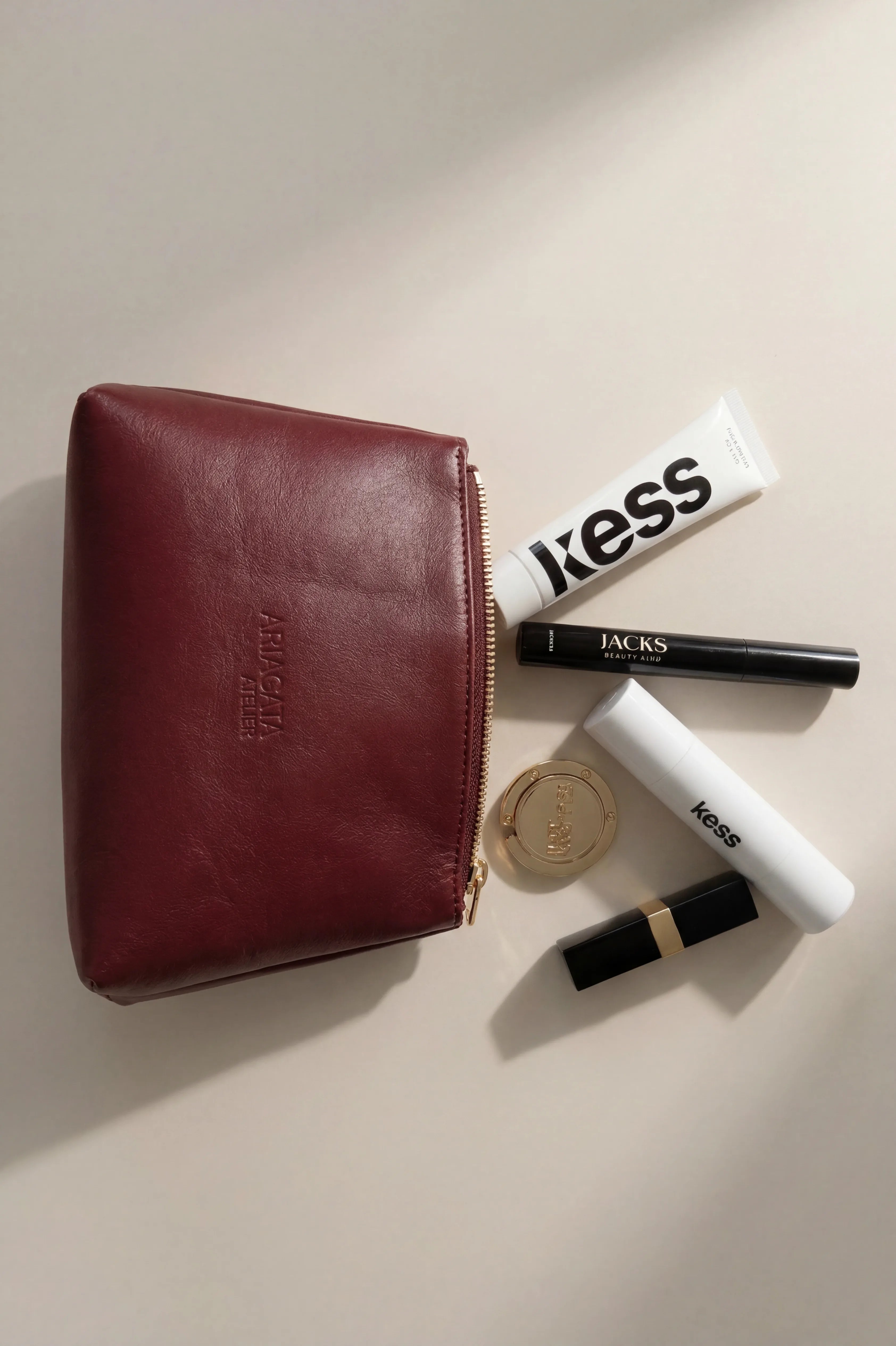 Bordeaux red cosmetic pouch detail view
